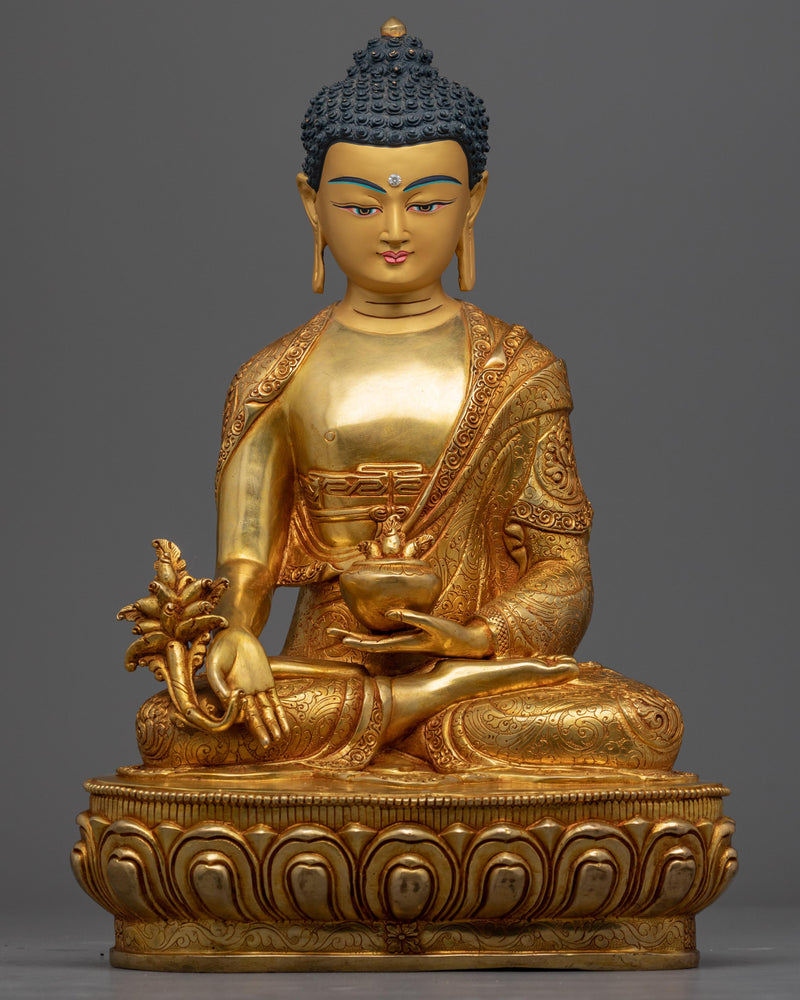 gold medicine buddha statue